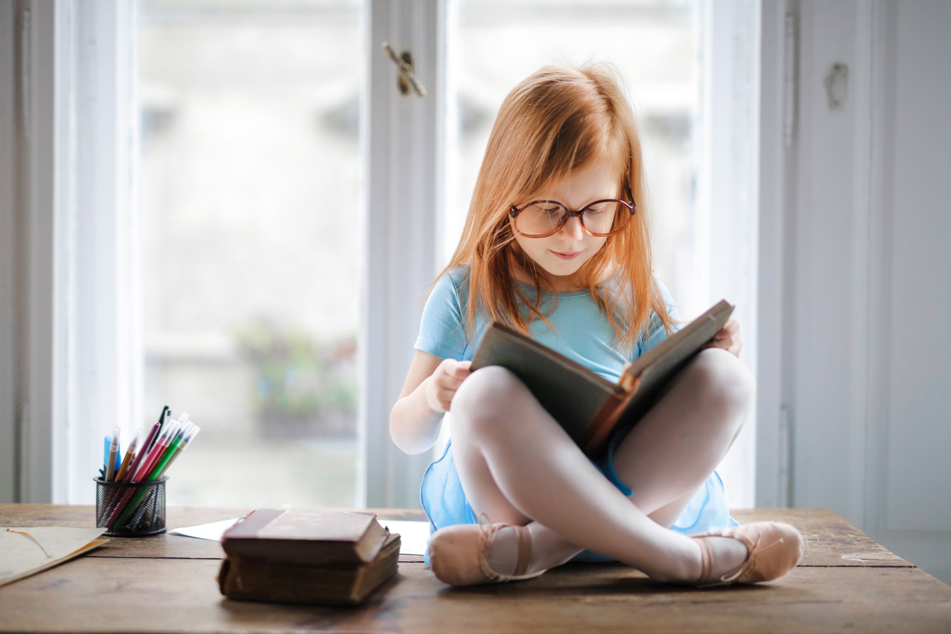 photo-of-girl-reading-book-3755707